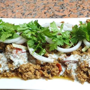 Chatpata Mutton Keema with Aloo Tikki inside